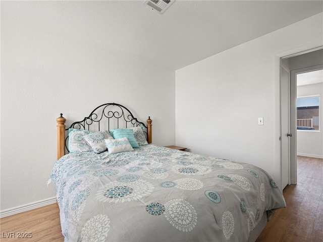 2214 Pebble Creek Ln, Laughlin, NV 89029 - bedroom with wood finished floors