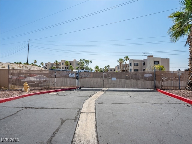 2214 Pebble Creek Ln, Laughlin, NV 89029 - view of street featuring curbs, a gate, and a residential view