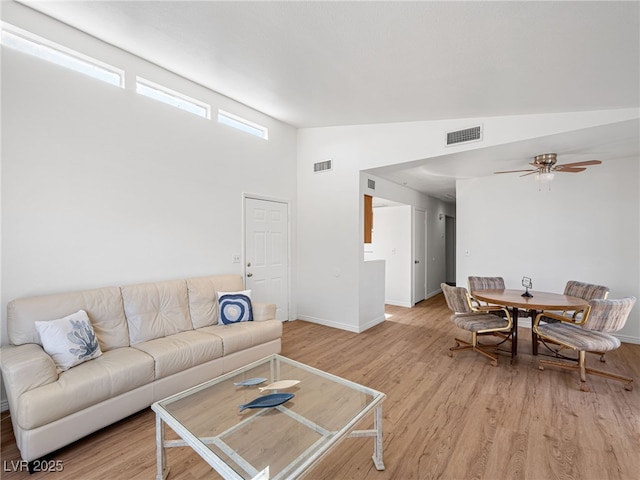 2214 Pebble Creek Ln, Laughlin, NV 89029 - living room with vaulted ceiling, light wood-type flooring, and ceiling fan