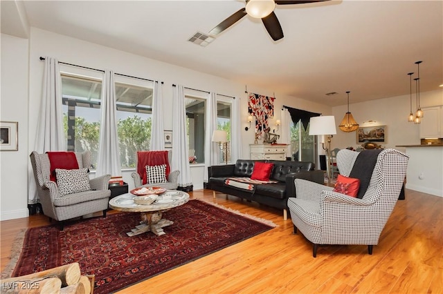 7209 Millerbird St, North Las Vegas, NV 89084 - living area featuring a ceiling fan and wood finished floors