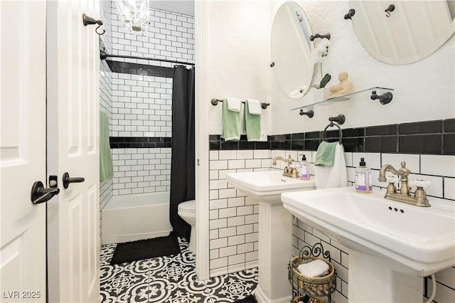 7209 Millerbird St, North Las Vegas, NV 89084 - bathroom featuring shower / bathtub combination with curtain, tile walls, and tile patterned floors