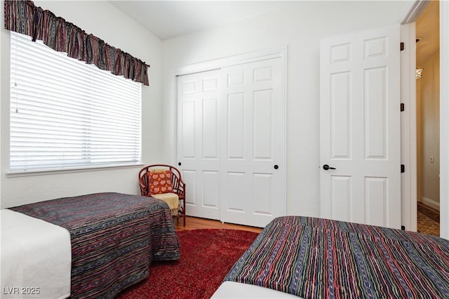 7209 Millerbird St, North Las Vegas, NV 89084 - bedroom featuring a closet and wood finished floors