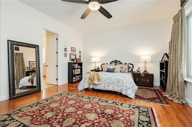 7209 Millerbird St, North Las Vegas, NV 89084 - bedroom with wood finished floors and a ceiling fan