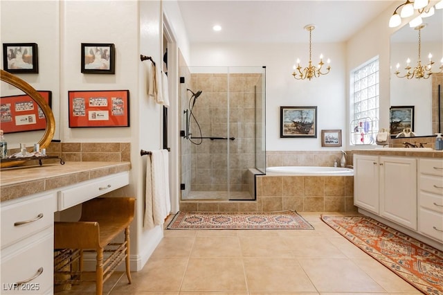 7209 Millerbird St, North Las Vegas, NV 89084 - full bath with a chandelier, a shower stall, two vanities, a bath, and recessed lighting