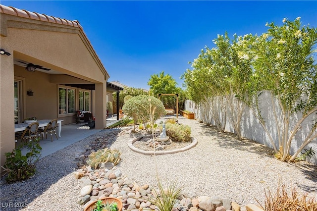 7209 Millerbird St, North Las Vegas, NV 89084 - fenced backyard featuring a patio