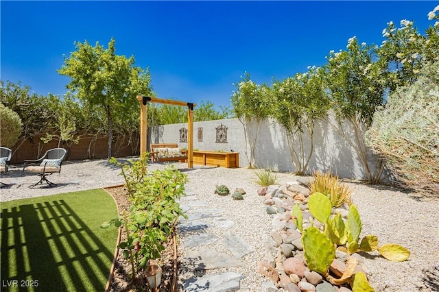 7209 Millerbird St, North Las Vegas, NV 89084 - fenced backyard featuring a patio
