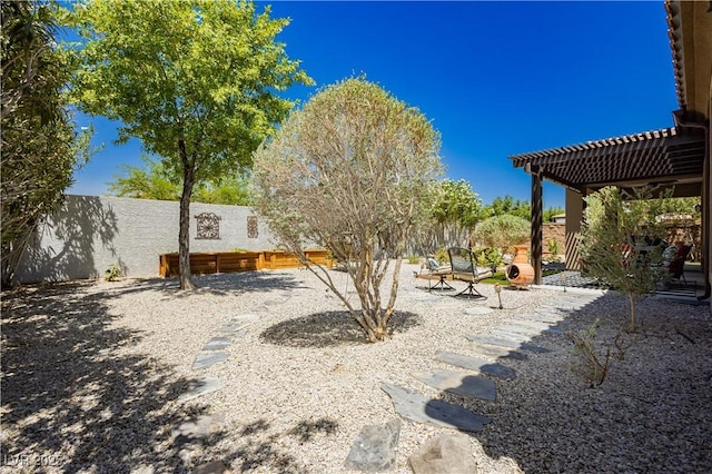 7209 Millerbird St, North Las Vegas, NV 89084 - fenced backyard featuring a patio area