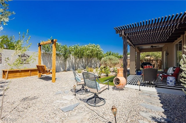 7209 Millerbird St, North Las Vegas, NV 89084 - fenced backyard with ceiling fan, a patio area, and a pergola