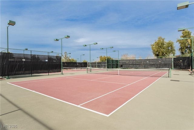 7209 Millerbird St, North Las Vegas, NV 89084 - view of tennis court featuring community basketball court