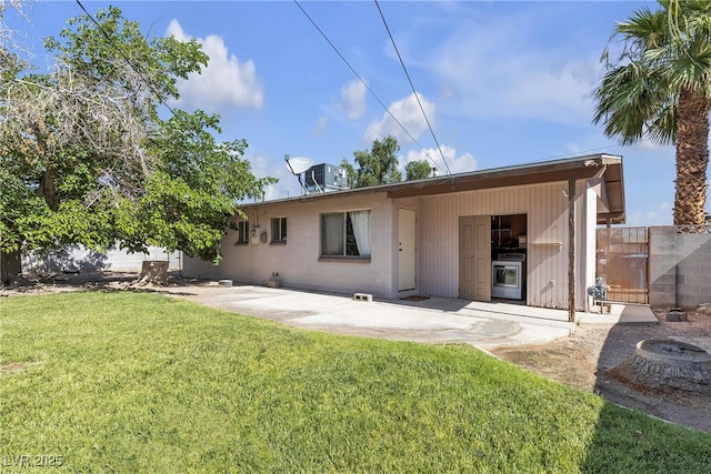 1037 Westminster Ave, Las Vegas, NV 89119 - back of property with a patio area and a gate