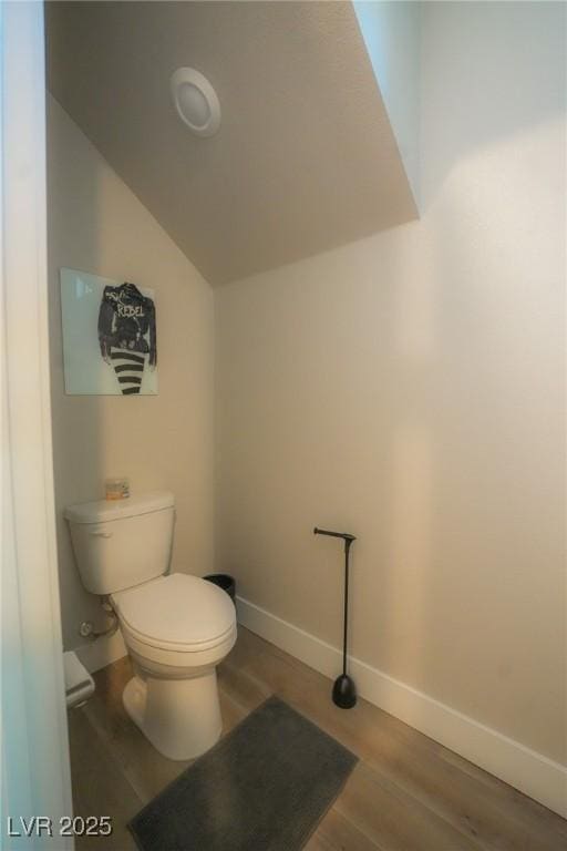 4182 Solace St, Las Vegas, NV 89135 - bathroom featuring vaulted ceiling and wood finished floors