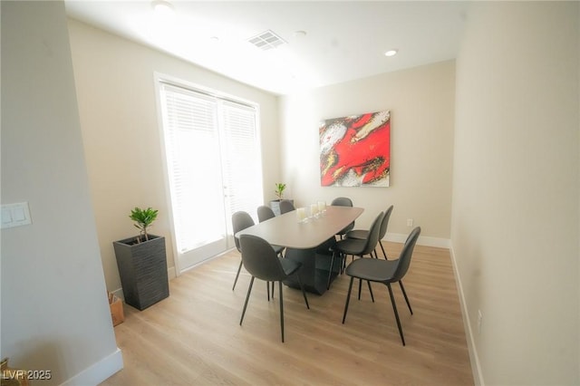 4182 Solace St, Las Vegas, NV 89135 - dining space featuring baseboards and light wood-style flooring