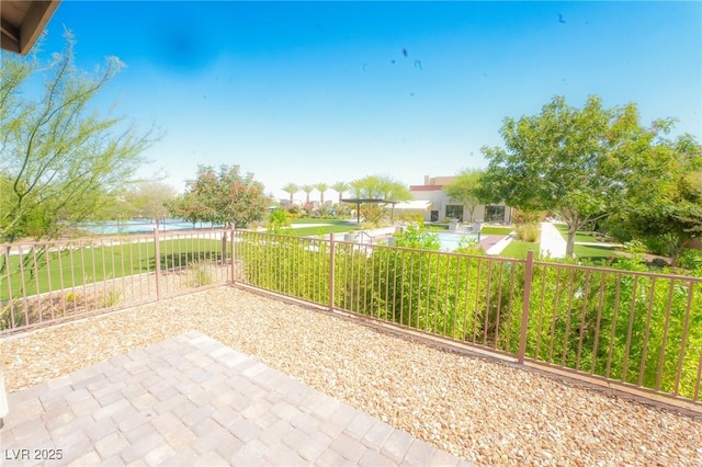 4182 Solace St, Las Vegas, NV 89135 - fenced backyard with a water view and a patio