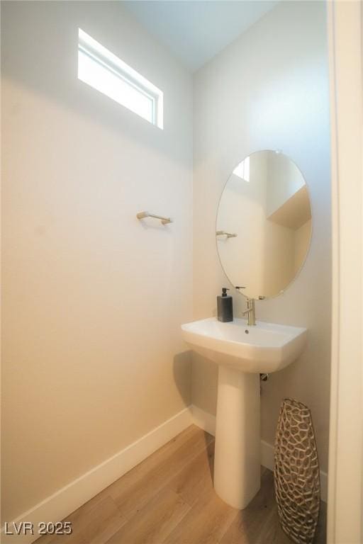 4182 Solace St, Las Vegas, NV 89135 - bathroom with wood finished floors and baseboards