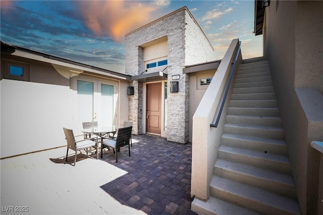 4182 Solace St, Las Vegas, NV 89135 - view of patio / terrace with stairway and outdoor dining area