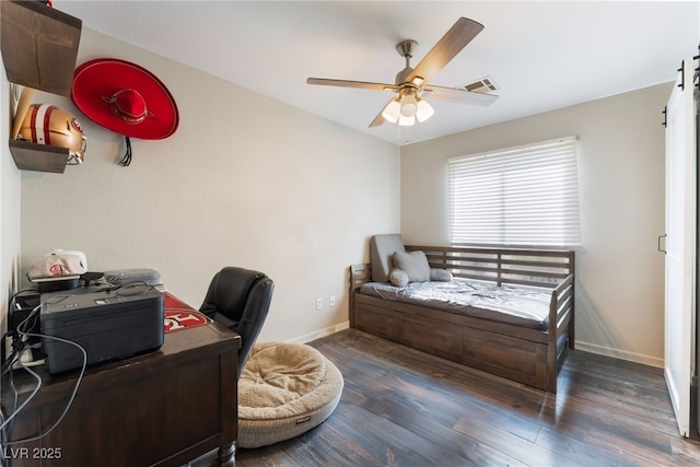 5243 Edna Crane Ave, North Las Vegas, NV 89031 - bedroom featuring wood finished floors, a desk, a barn door, and ceiling fan