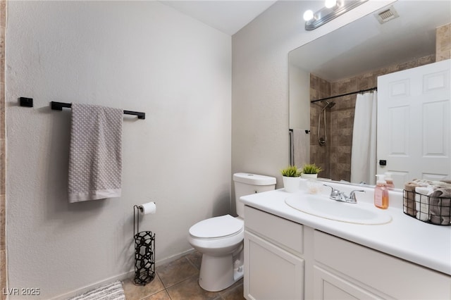 5243 Edna Crane Ave, North Las Vegas, NV 89031 - bathroom featuring vanity, a tile shower, and tile patterned floors