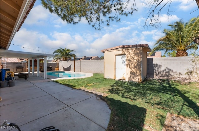5243 Edna Crane Ave, North Las Vegas, NV 89031 - fenced backyard featuring a storage unit and a patio