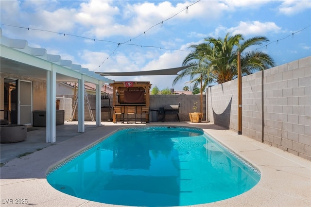 5243 Edna Crane Ave, North Las Vegas, NV 89031 - view of swimming pool featuring a fenced backyard and a patio