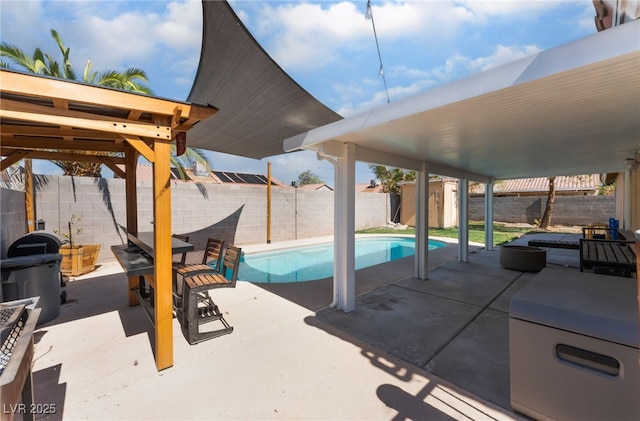 5243 Edna Crane Ave, North Las Vegas, NV 89031 - view of swimming pool featuring a patio and a fenced backyard
