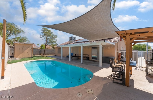 5243 Edna Crane Ave, North Las Vegas, NV 89031 - view of pool with a patio area, a fenced backyard, and a shed