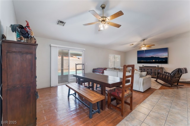 5243 Edna Crane Ave, North Las Vegas, NV 89031 - dining area featuring ceiling fan, lofted ceiling, and light wood finished floors
