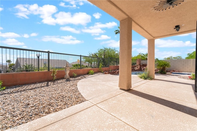 1016 Eaglewood Dr, Las Vegas, NV 89144 - fenced backyard featuring a patio area