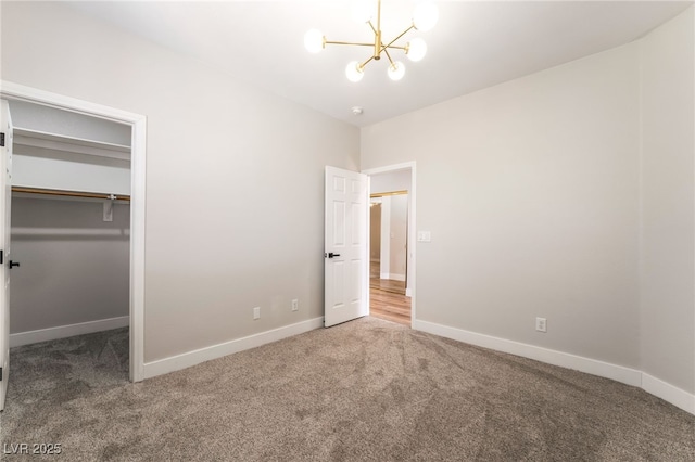 1016 Eaglewood Dr, Las Vegas, NV 89144 - unfurnished bedroom with carpet flooring, a chandelier, and a spacious closet