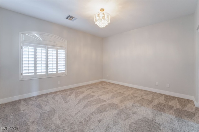 1016 Eaglewood Dr, Las Vegas, NV 89144 - spare room with a chandelier and carpet flooring