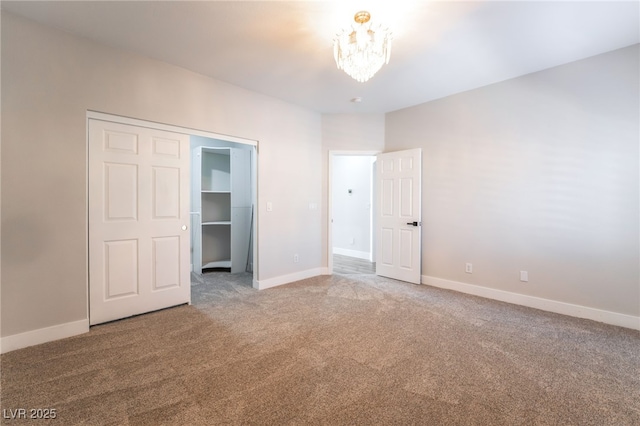 1016 Eaglewood Dr, Las Vegas, NV 89144 - unfurnished bedroom featuring carpet floors, a chandelier, and a closet