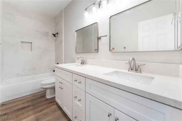 1016 Eaglewood Dr, Las Vegas, NV 89144 - bathroom with double vanity,  shower combination, and wood finished floors