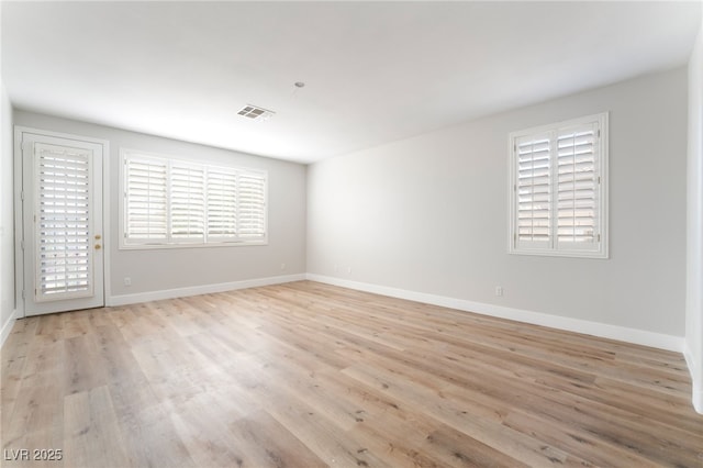 1016 Eaglewood Dr, Las Vegas, NV 89144 - unfurnished room featuring light wood-type flooring and plenty of natural light