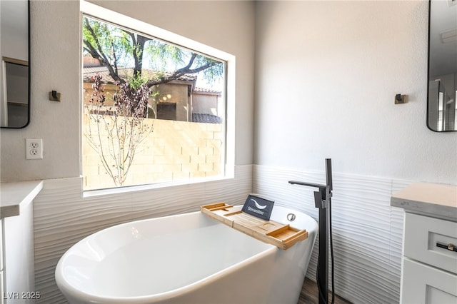 1016 Eaglewood Dr, Las Vegas, NV 89144 - bathroom with a freestanding tub and vanity