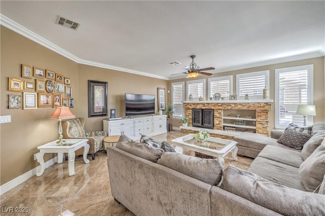 56 Ancient Hills Ln, Henderson, NV 89074 - living room with ornamental molding, ceiling fan, and a stone fireplace