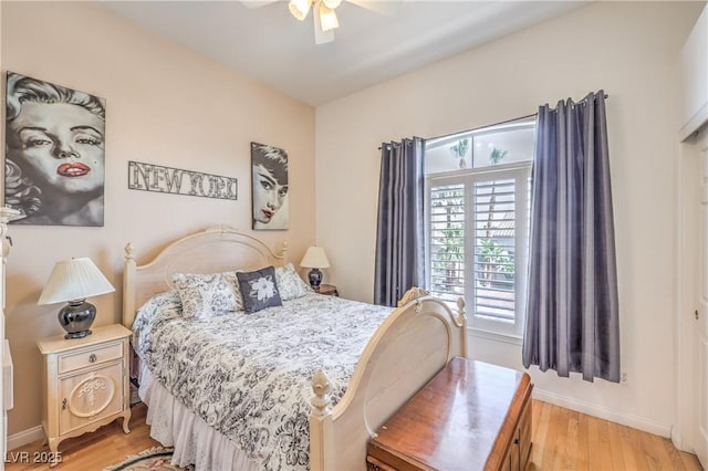 56 Ancient Hills Ln, Henderson, NV 89074 - bedroom with light wood-style floors and a ceiling fan