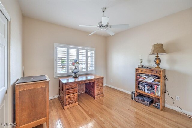 56 Ancient Hills Ln, Henderson, NV 89074 - office area with light wood-type flooring and a ceiling fan