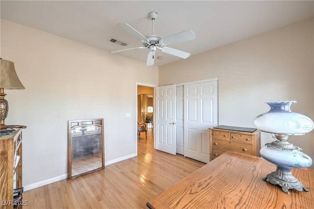 56 Ancient Hills Ln, Henderson, NV 89074 - office featuring light wood finished floors, a ceiling fan, and arched walkways