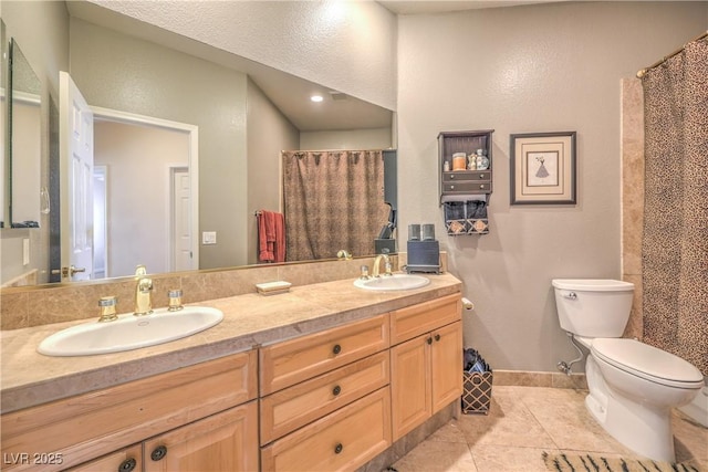 56 Ancient Hills Ln, Henderson, NV 89074 - full bath with double vanity, tile patterned flooring, and curtained shower