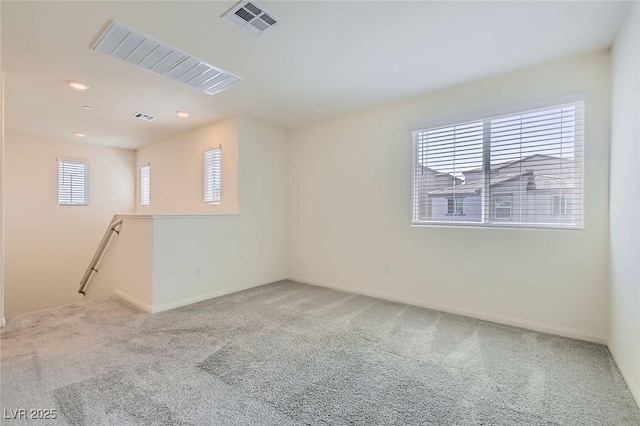 2670 Mango Light Ave, North Las Vegas, NV 89086 - carpeted spare room with baseboards and recessed lighting