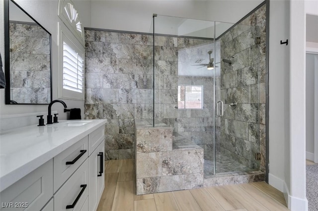 1844 Grand Prairie Ave, North Las Vegas, NV 89032 - bathroom featuring vanity, healthy amount of natural light, a ceiling fan, and a stall shower