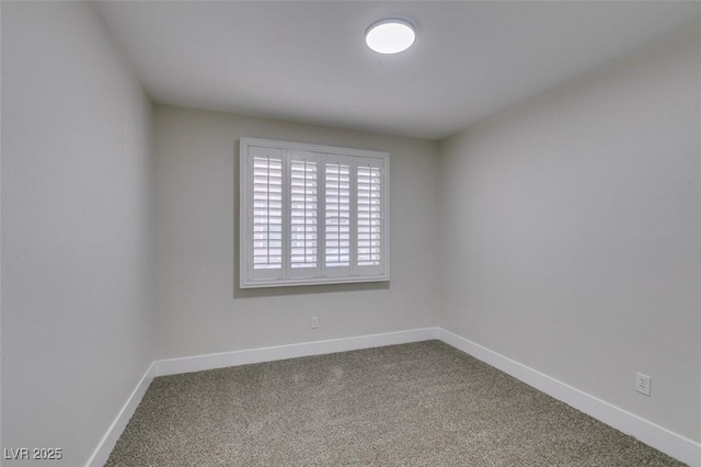 1844 Grand Prairie Ave, North Las Vegas, NV 89032 - unfurnished room with carpet floors and baseboards