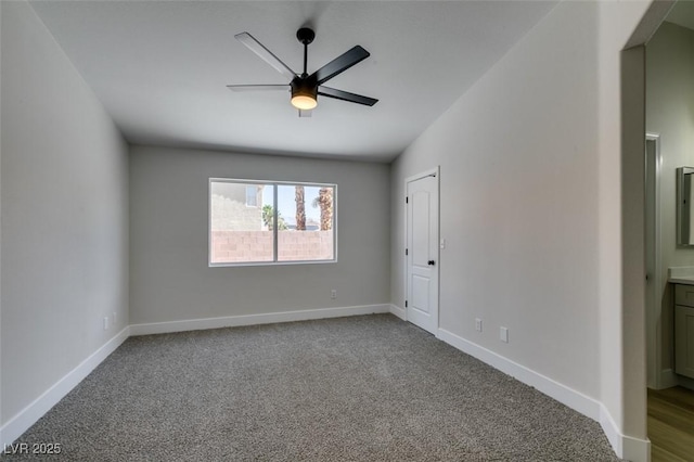 1844 Grand Prairie Ave, North Las Vegas, NV 89032 - empty room with a ceiling fan and carpet flooring