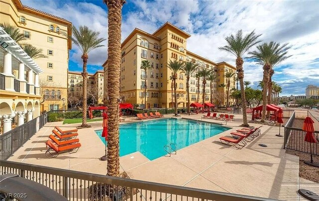 2455 W Serene Ave Unit 620, Las Vegas, NV 89123 - community pool with a patio area