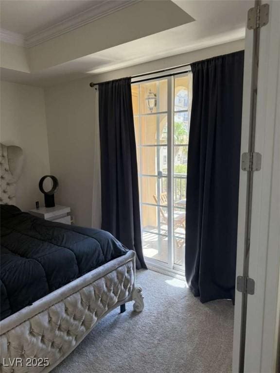 2455 W Serene Ave Unit 620, Las Vegas, NV 89123 - bedroom with carpet, access to outside, and crown molding