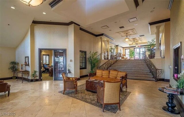 2455 W Serene Ave Unit 620, Las Vegas, NV 89123 - lobby with ornamental molding, a towering ceiling, and stairs