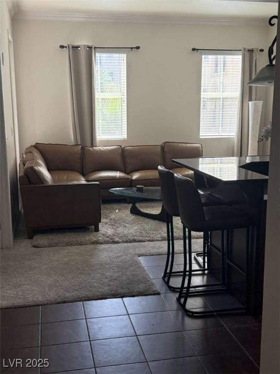 2455 W Serene Ave Unit 620, Las Vegas, NV 89123 - living area with ornamental molding and dark tile patterned floors