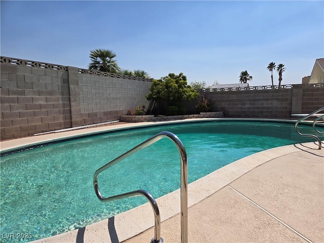 7704 Peacock Ave, Las Vegas, NV 89145 - view of swimming pool with a fenced backyard