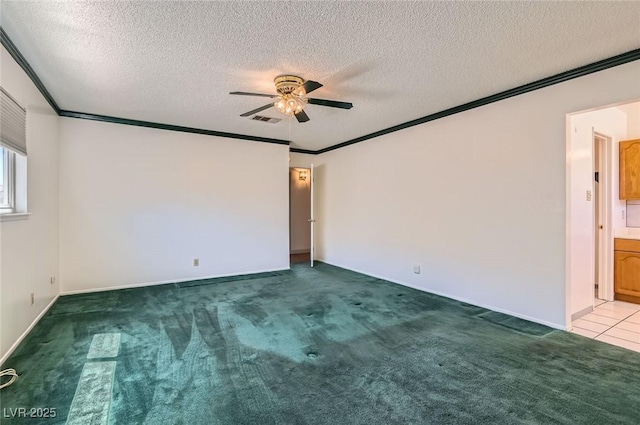 7704 Peacock Ave, Las Vegas, NV 89145 - carpeted spare room with a ceiling fan, crown molding, and a textured ceiling
