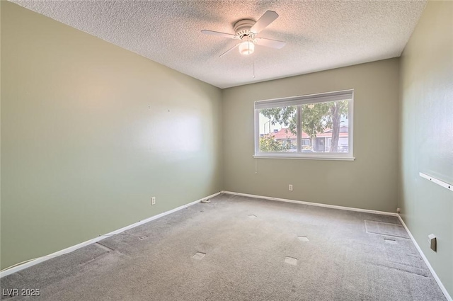 7704 Peacock Ave, Las Vegas, NV 89145 - carpeted spare room with a textured ceiling and ceiling fan
