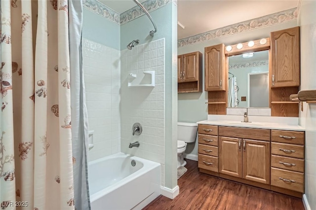 7704 Peacock Ave, Las Vegas, NV 89145 - bathroom with shower / tub combo with curtain, vanity, and wood finished floors